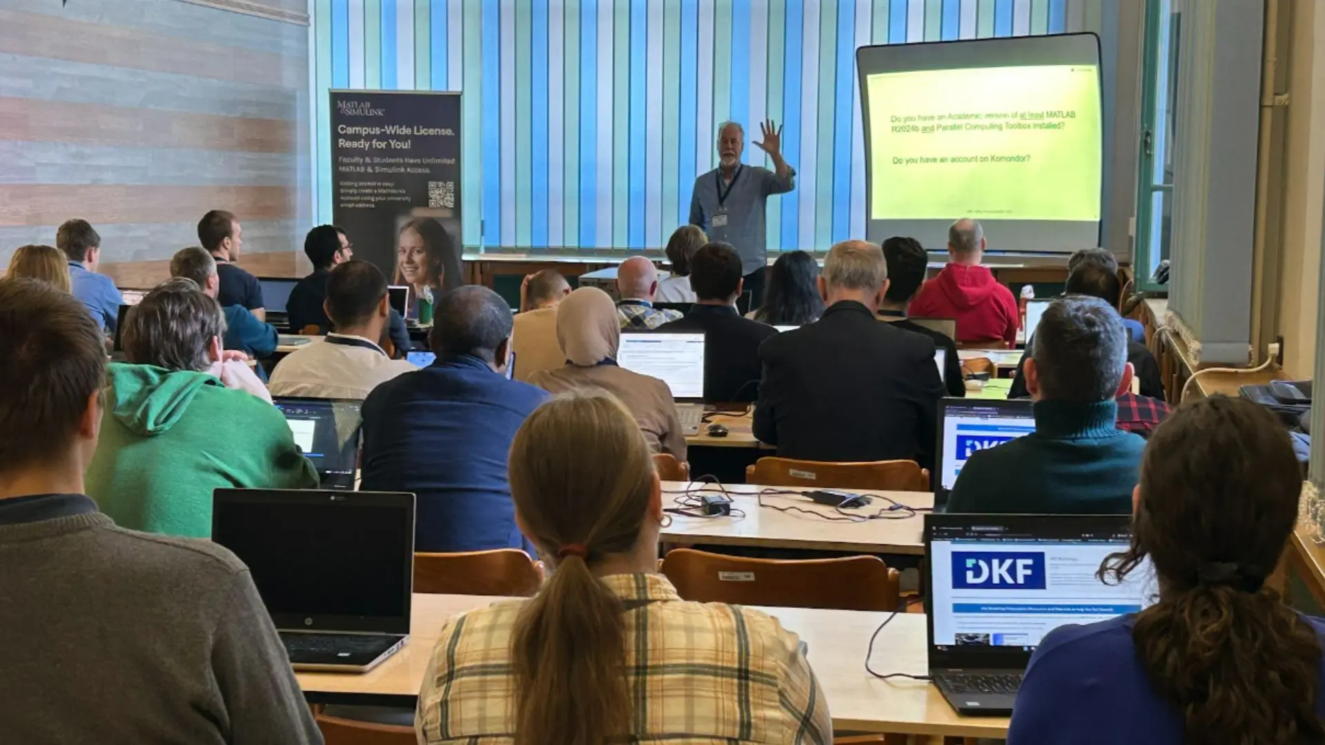 Attendees learning parallel computing techniques at a MATLAB HPC workshop in Budapest